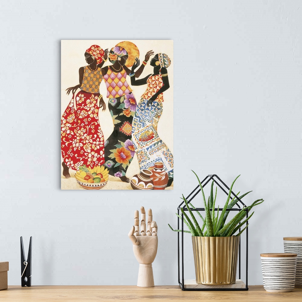 A bohemian room featuring Three African women in beautiful patterned robes celebrating.