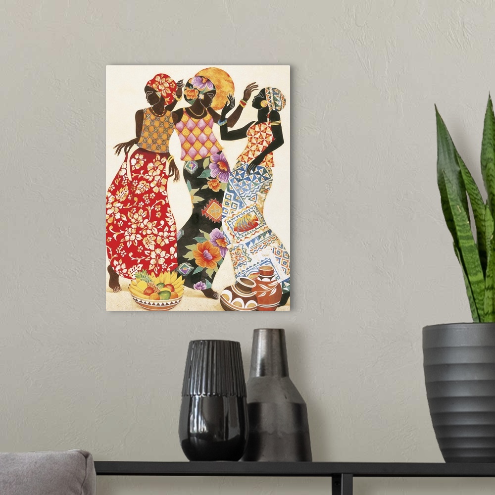 A modern room featuring Three African women in beautiful patterned robes celebrating.