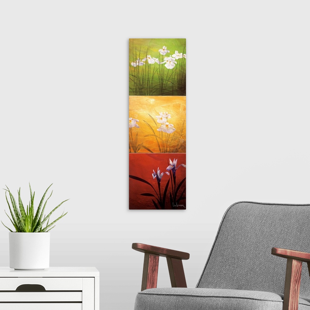 A modern room featuring A long vertical painting of flowers in three panels of red, green and yellow.