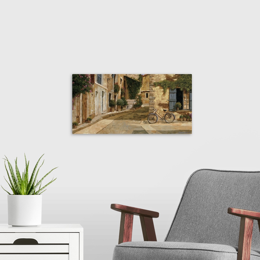 A modern room featuring Painting of a bicycle outside a store in a European village.