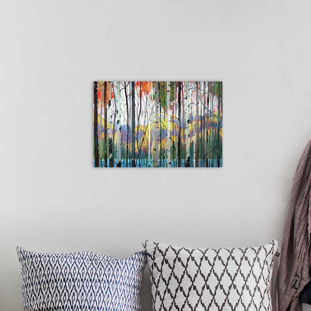 A bohemian room featuring Contemporary painting of a forest full of colorful trees in tones of red, yellow and orange with ...