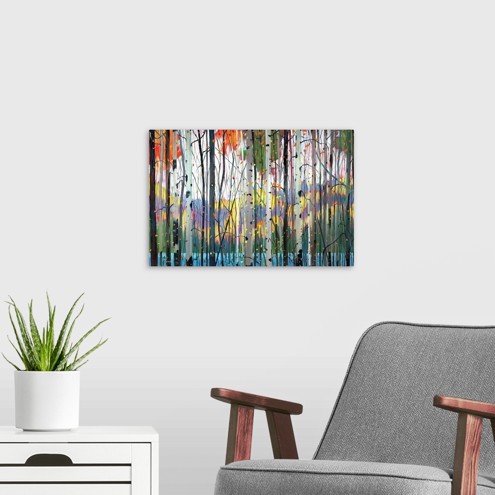 A modern room featuring Contemporary painting of a forest full of colorful trees in tones of red, yellow and orange with ...