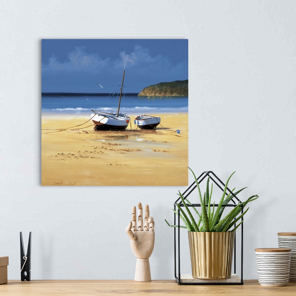 A bohemian room featuring Contemporary painting of two boats moored on a sandy beach.