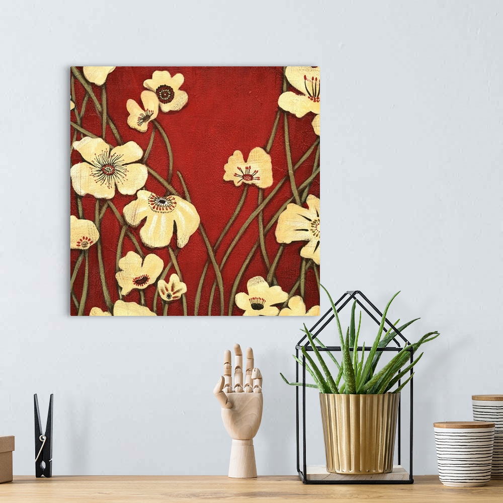 A bohemian room featuring Contemporary painting of a group of yellow flowers with tall stems against a red backdrop.