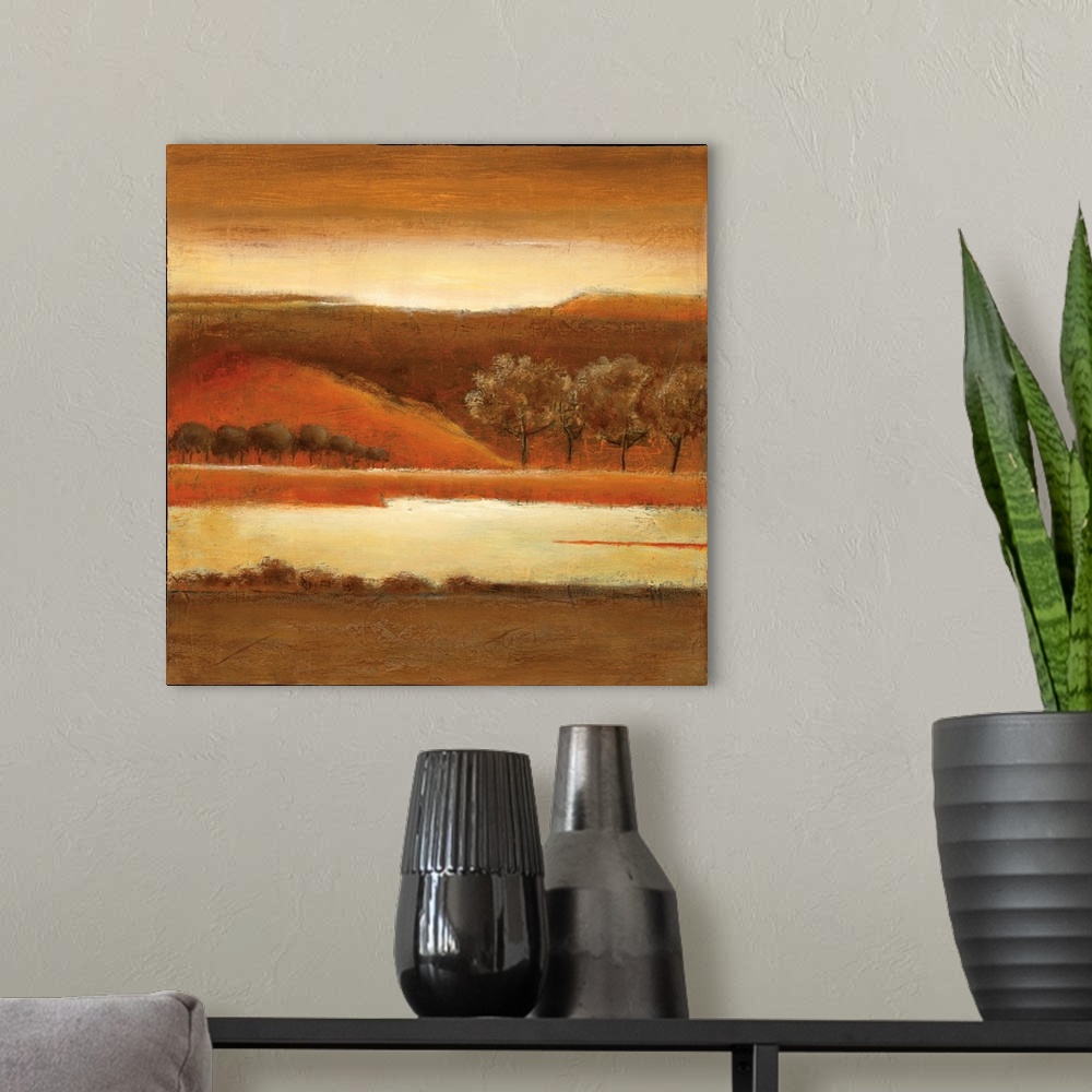 A modern room featuring A textured landscape of rolling hills with trees in tones of brown and orange.