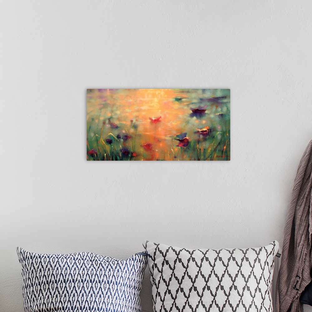 A bohemian room featuring A bright colored horizontal painting of multi-colored lily pads on a body of water with the refle...