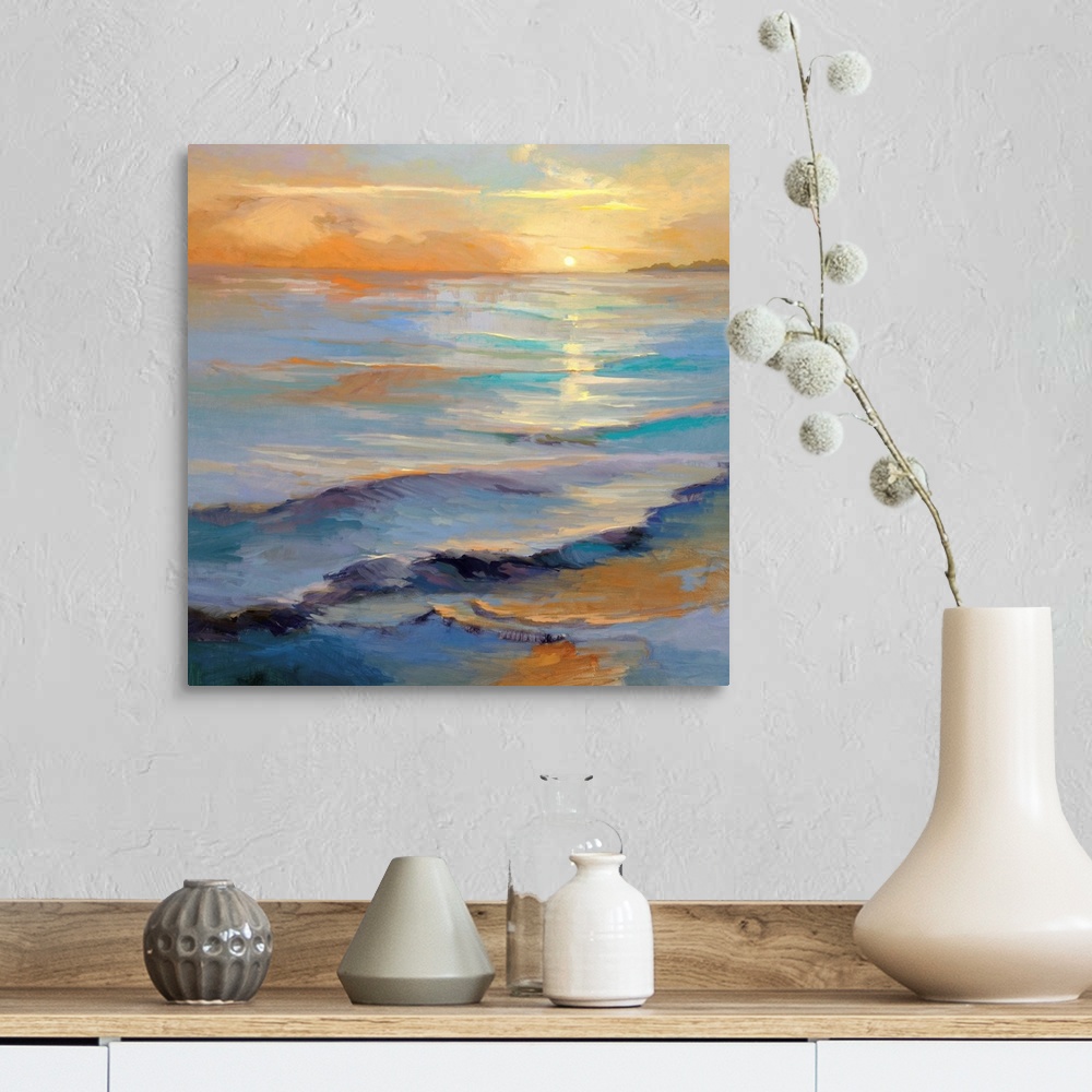 A farmhouse room featuring Square painting of gentle waves in the ocean with the sun reflecting in the water.