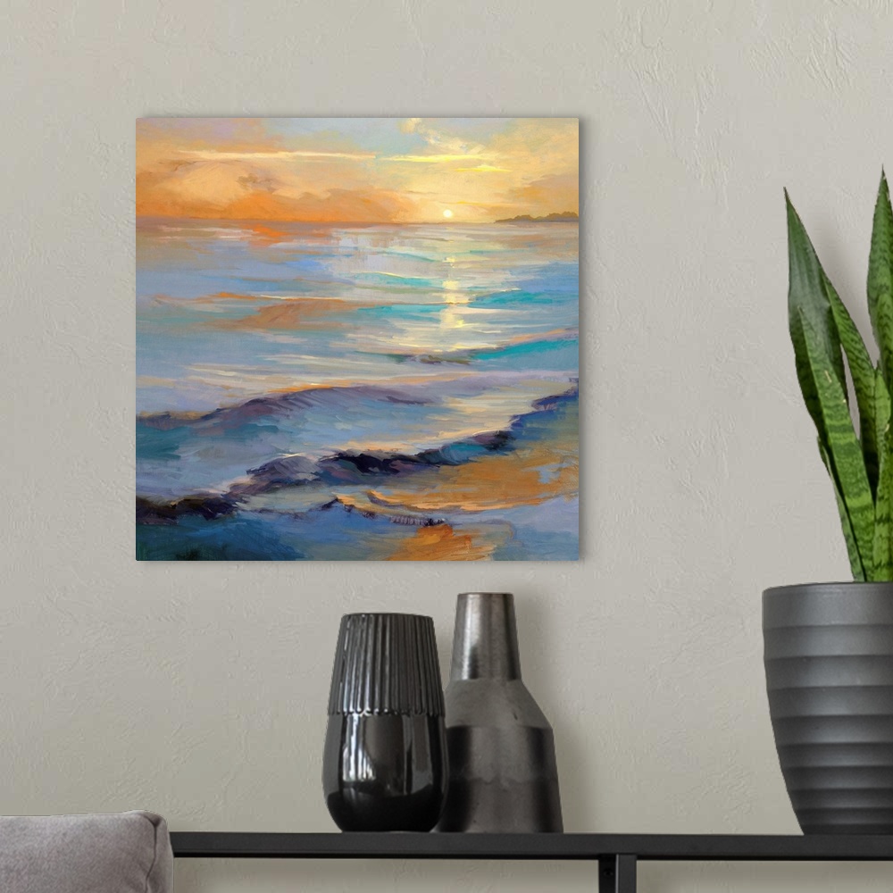 A modern room featuring Square painting of gentle waves in the ocean with the sun reflecting in the water.