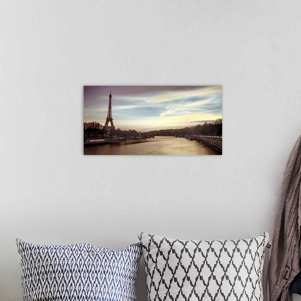 A bohemian room featuring Panoramic image of Paris with the Eiffel tower and Seine River in the evening.