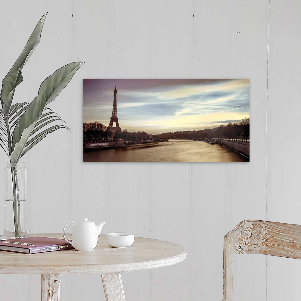 A farmhouse room featuring Panoramic image of Paris with the Eiffel tower and Seine River in the evening.