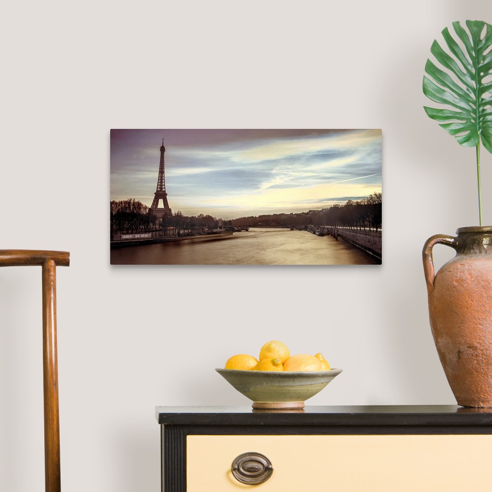 A traditional room featuring Panoramic image of Paris with the Eiffel tower and Seine River in the evening.