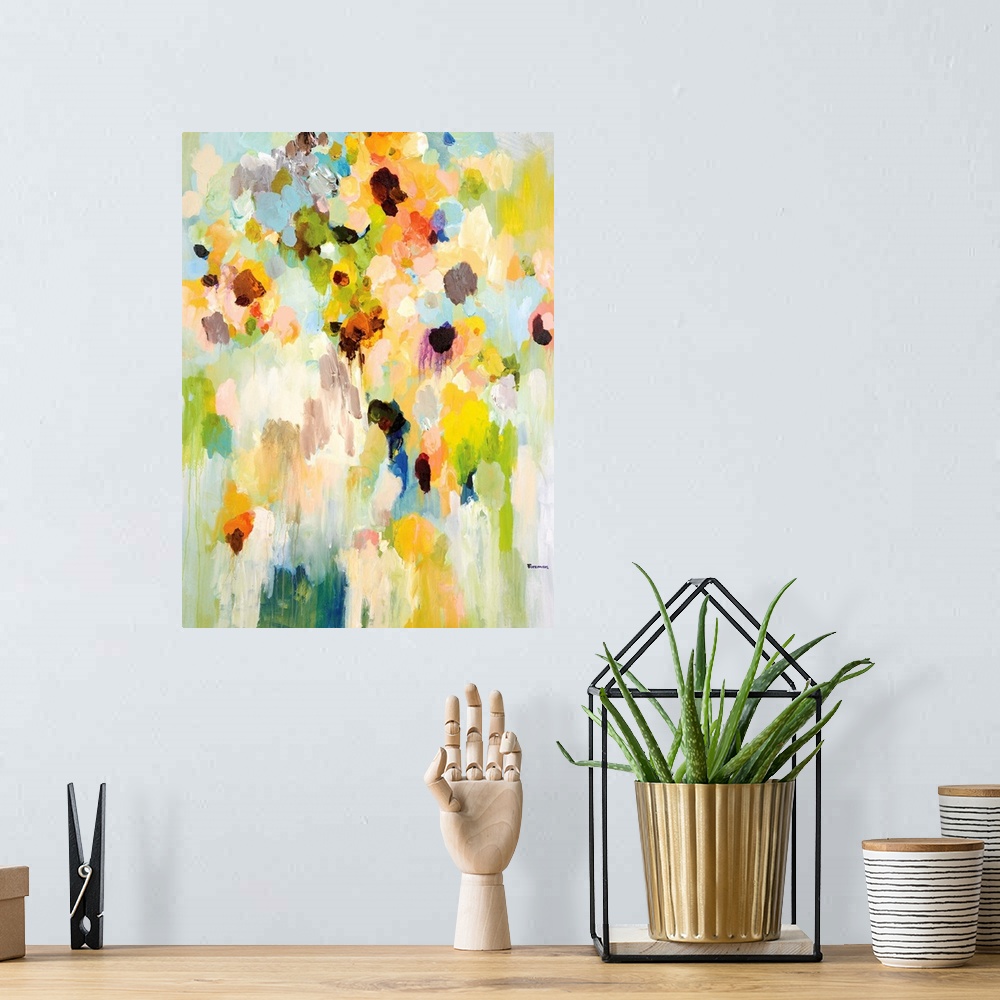 A bohemian room featuring An abstract floral painting of a large vase of bright colored flowers blending together in small ...