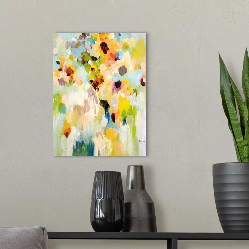 A modern room featuring An abstract floral painting of a large vase of bright colored flowers blending together in small ...