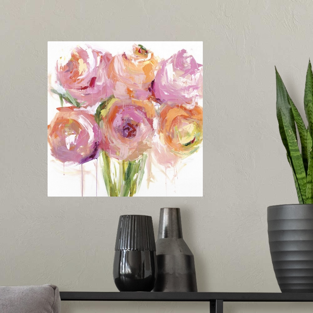 A modern room featuring Square painting of large peony blooms in bright shades of pink, orange, white and red.