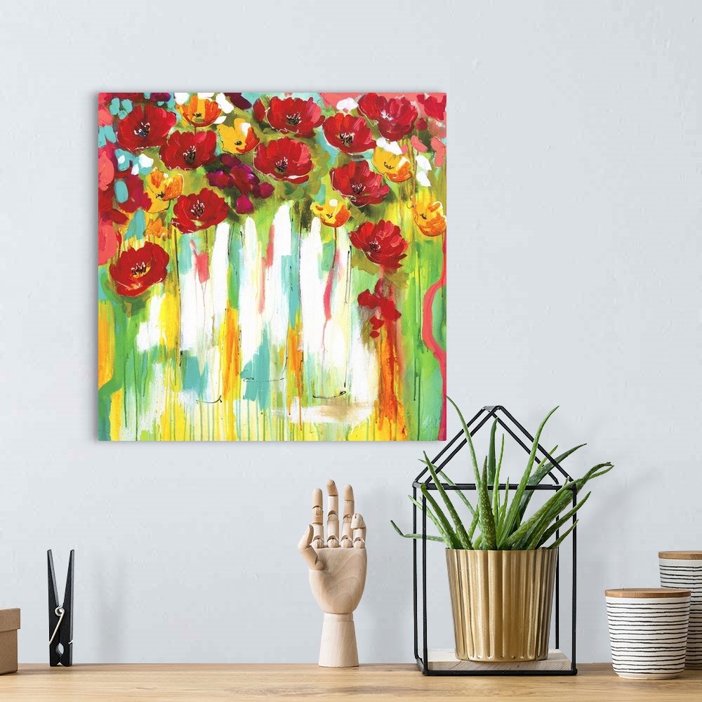 A bohemian room featuring Square contemporary painting of a bunch of red and yellow poppies in vases.