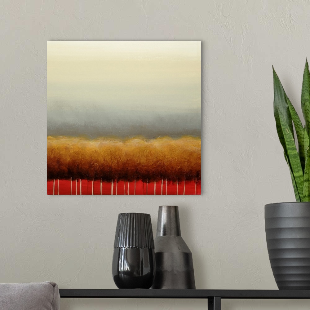 A modern room featuring Square painting of a grove of golden trees with a red background and a wide gray sky above.