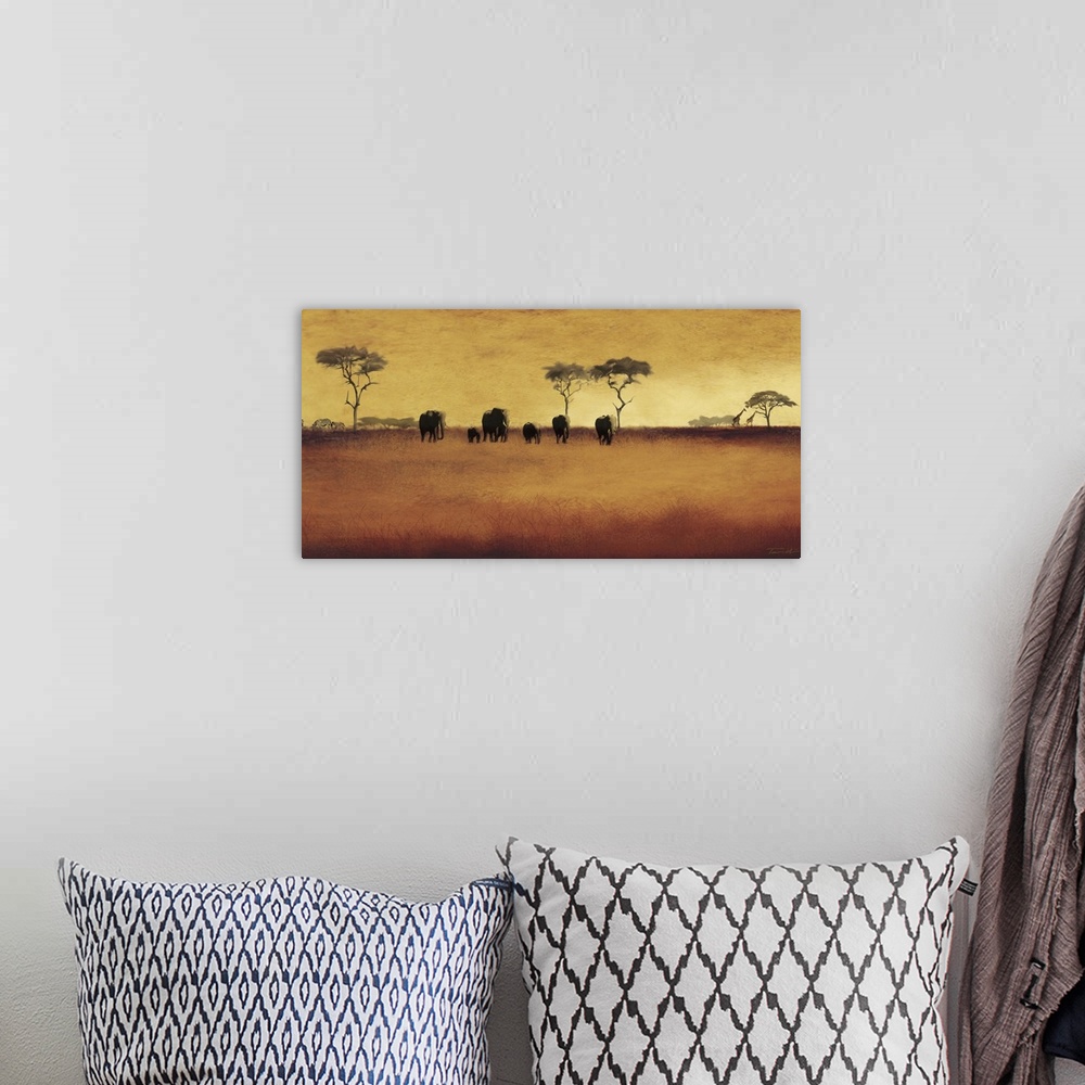 A bohemian room featuring Painting of the African plains with animals in the distance.