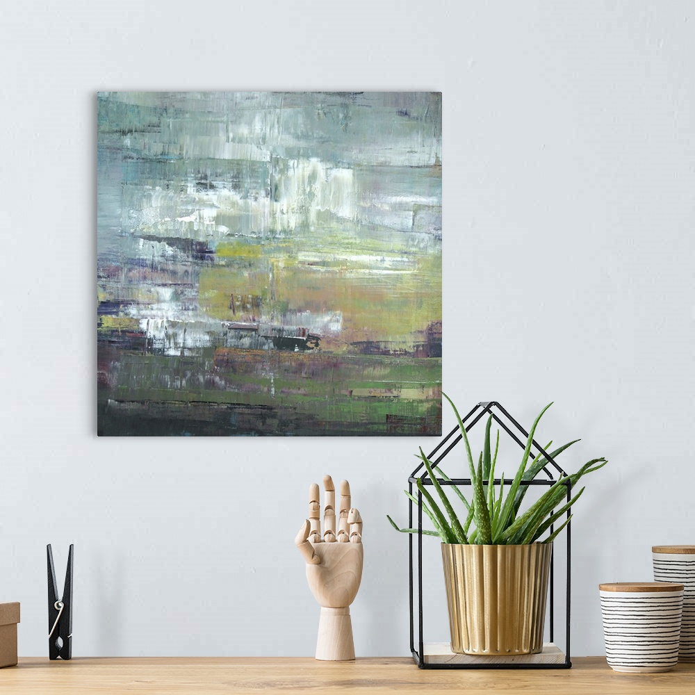 A bohemian room featuring Square abstract painting in shades of green and gray.