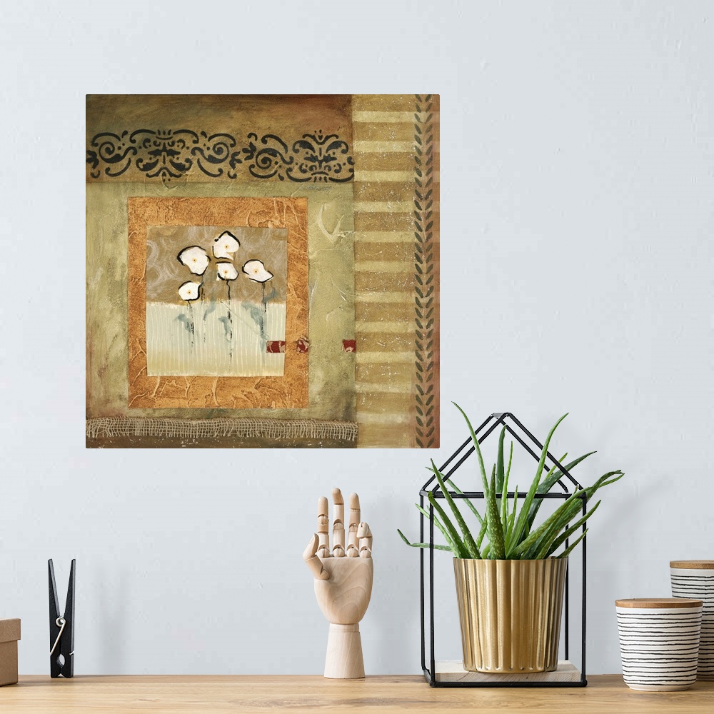 A bohemian room featuring A mixed media design of white flowers framed by a gold box which is bordered on two sides by a fl...