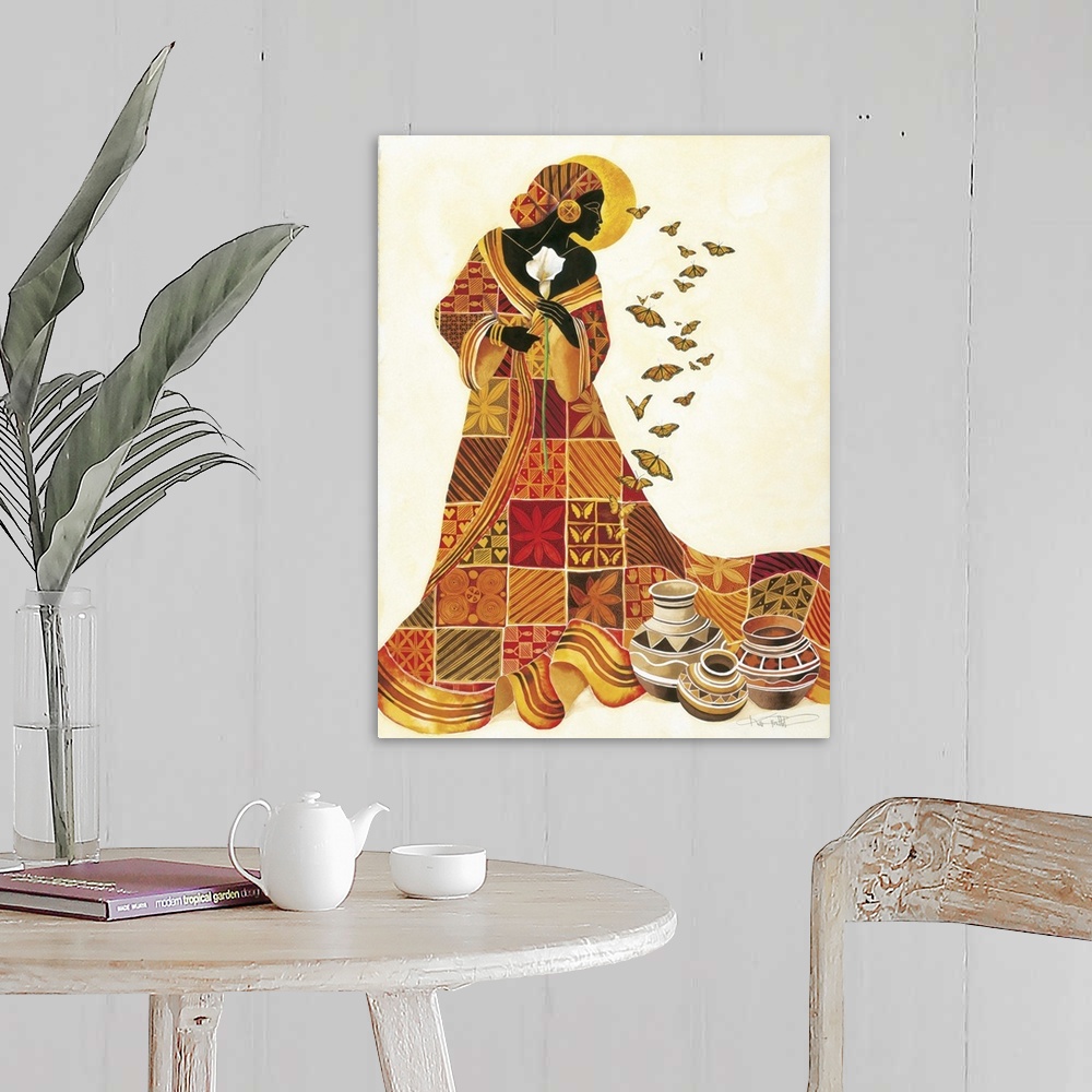 A farmhouse room featuring Artwork of an African woman in a patterned orange robe holding a flower and looking at butterflies.