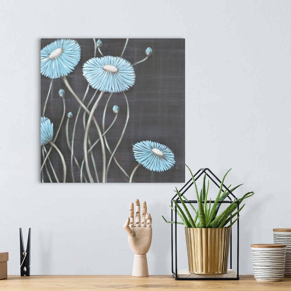 A bohemian room featuring Square contemporary painting of light blue flowers with long stems against a gray backdrop.