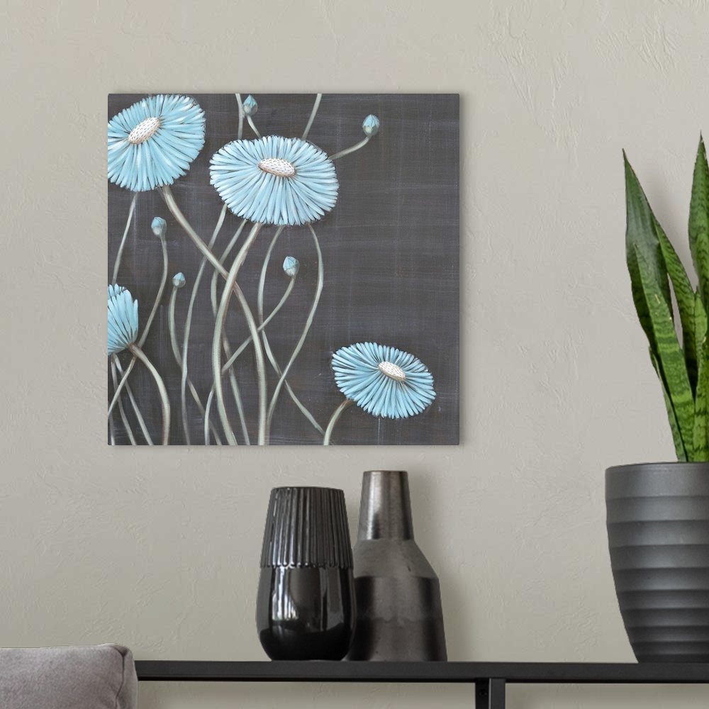 A modern room featuring Square contemporary painting of light blue flowers with long stems against a gray backdrop.