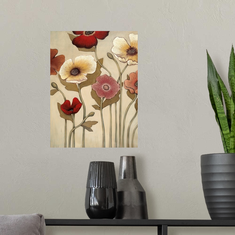 A modern room featuring Vertical painting of a group of red, pink and yellow flowers against a neutral backdrop.