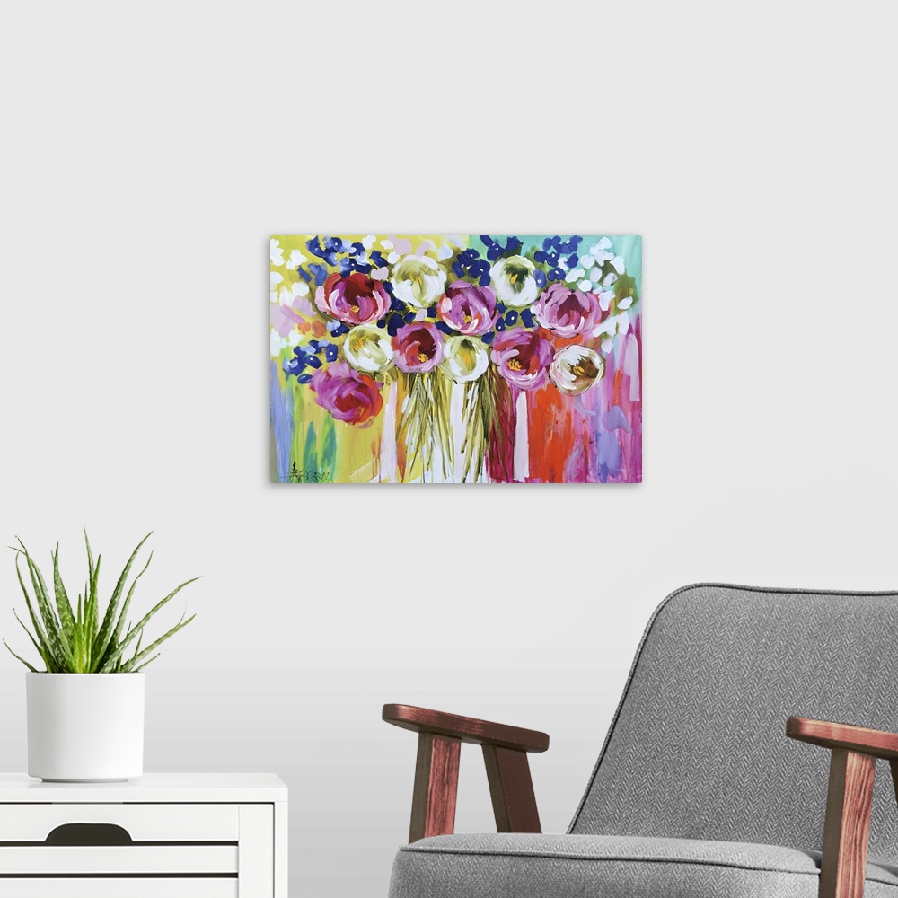 A modern room featuring A colorful contemporary painting of a group of flowers on a multi-colored background.