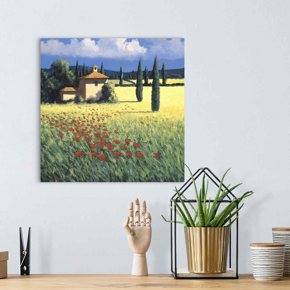 A bohemian room featuring Painting of a field of poppies near a farm house in Tuscany.