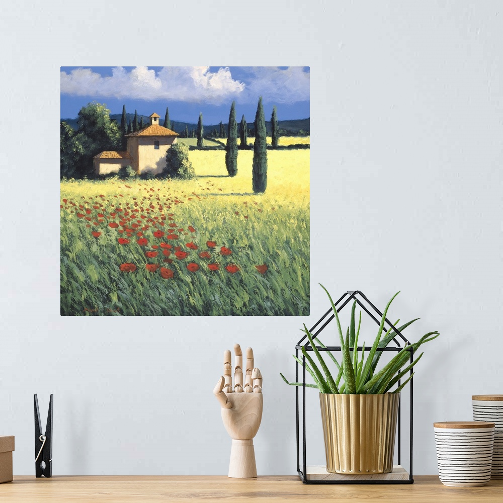 A bohemian room featuring Painting of a field of poppies near a farm house in Tuscany.