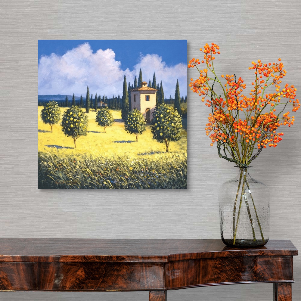 A traditional room featuring Contemporary artwork of an orchard in Tuscany with yellow fields.