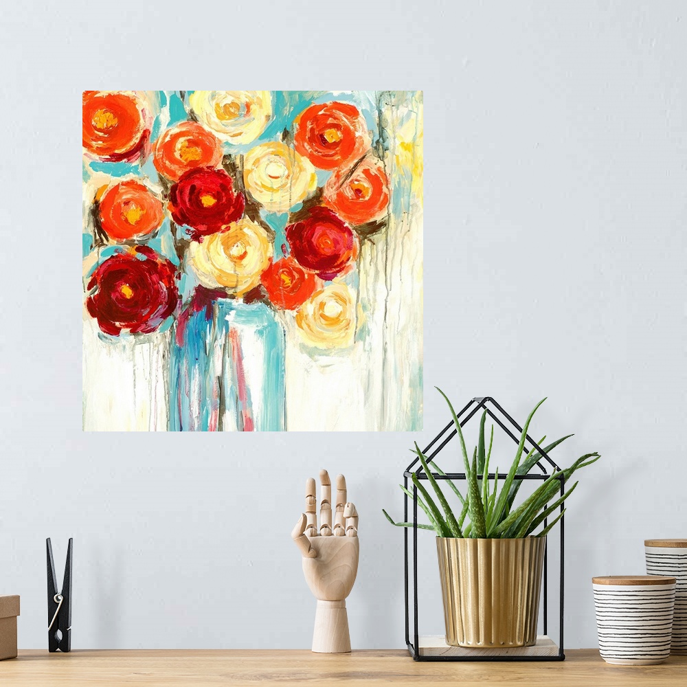 A bohemian room featuring A complementary painting of a large vase of bright orange, red and yellow flowers in textured and...