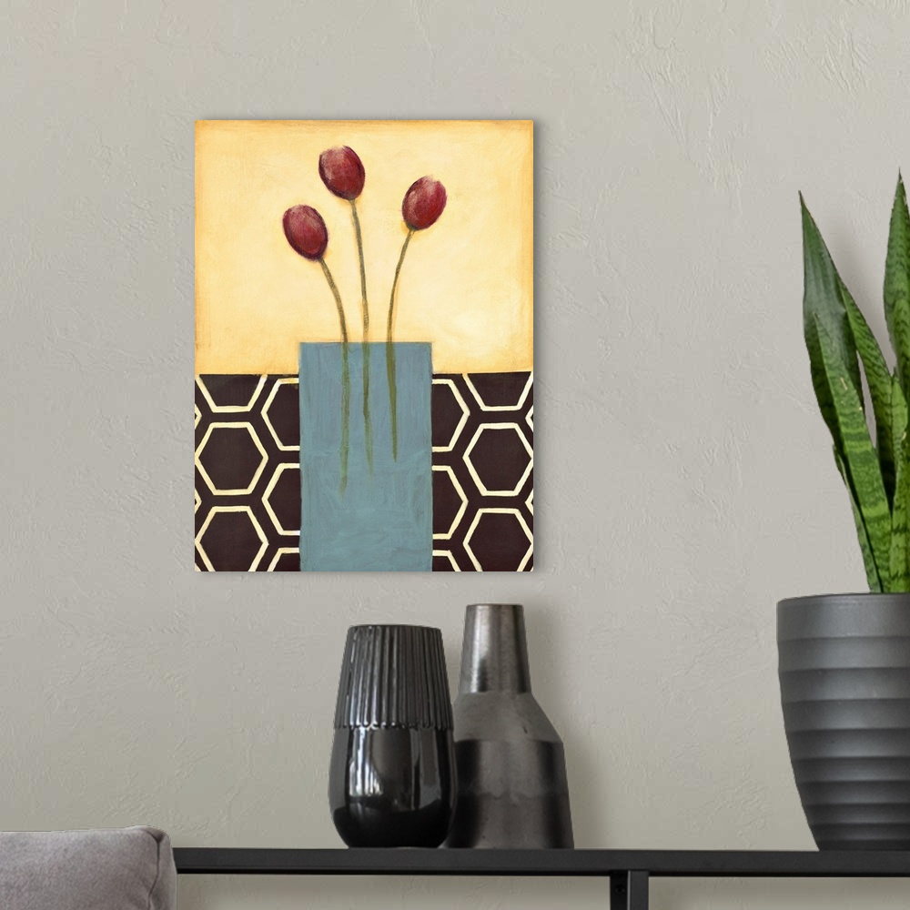 A modern room featuring Vertical painting of a vase of red tulips with modern patterned backdrop.