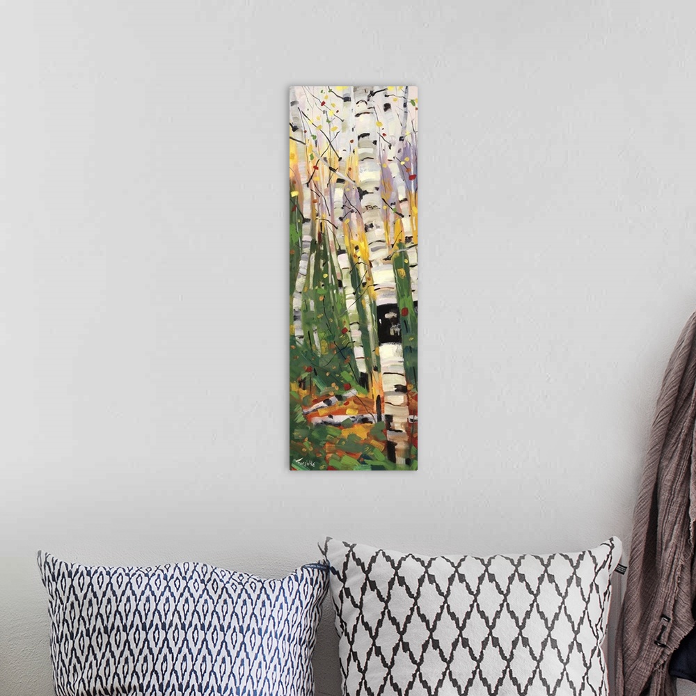 A bohemian room featuring A colorful vertical painting of a forest of birch trees with vibrant colors of yellow, purple and...