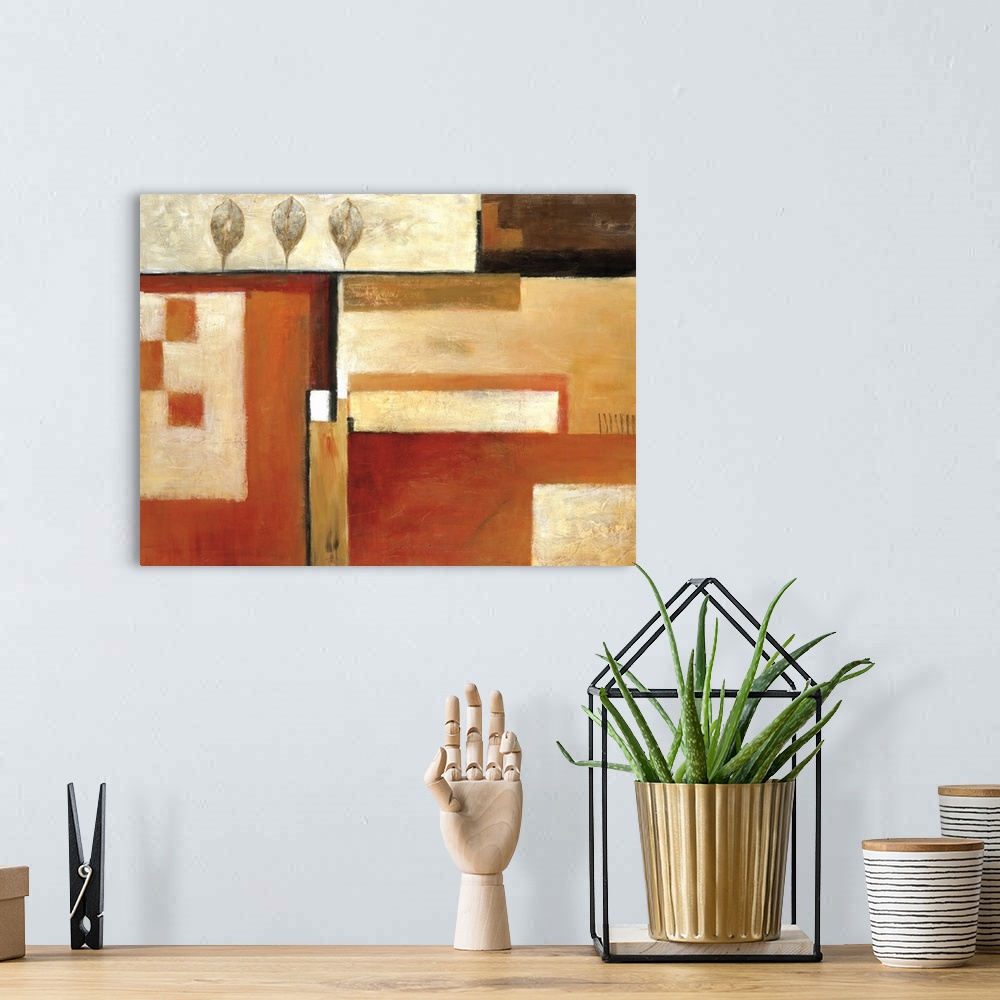 A bohemian room featuring Abstract painting of squared shapes overlapped with a row of leaves, all done in earth tones.