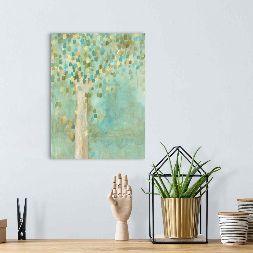 A bohemian room featuring A contemporary painting of a solo tree full of small leaves in different shades of green.