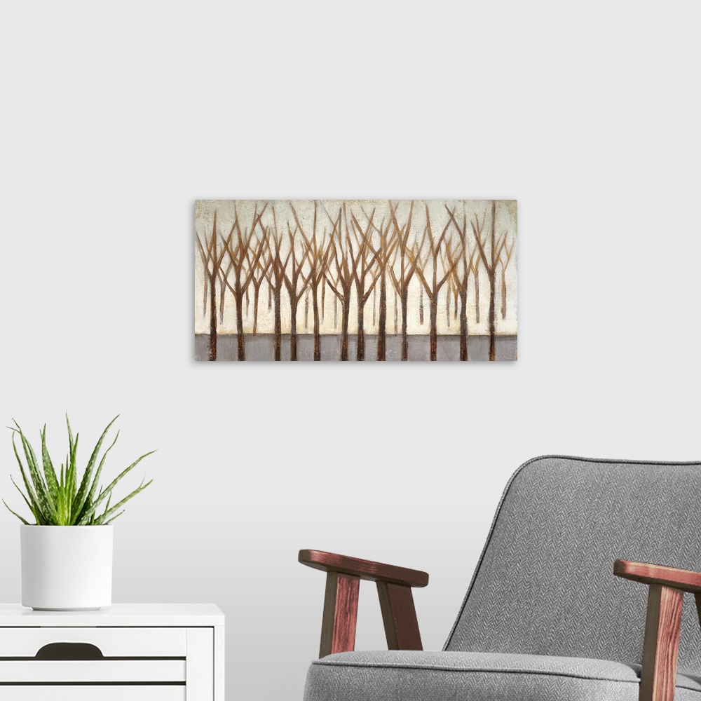A modern room featuring A horizontal painting of a group of bare brown trees against a neutral backdrop.
