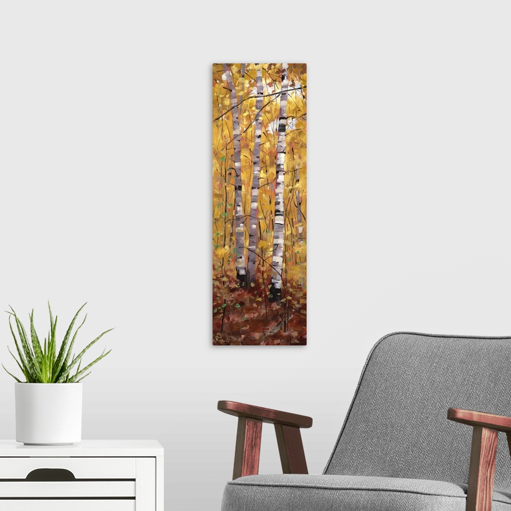 A modern room featuring A long vertical painting of trees in the forest in the fall.