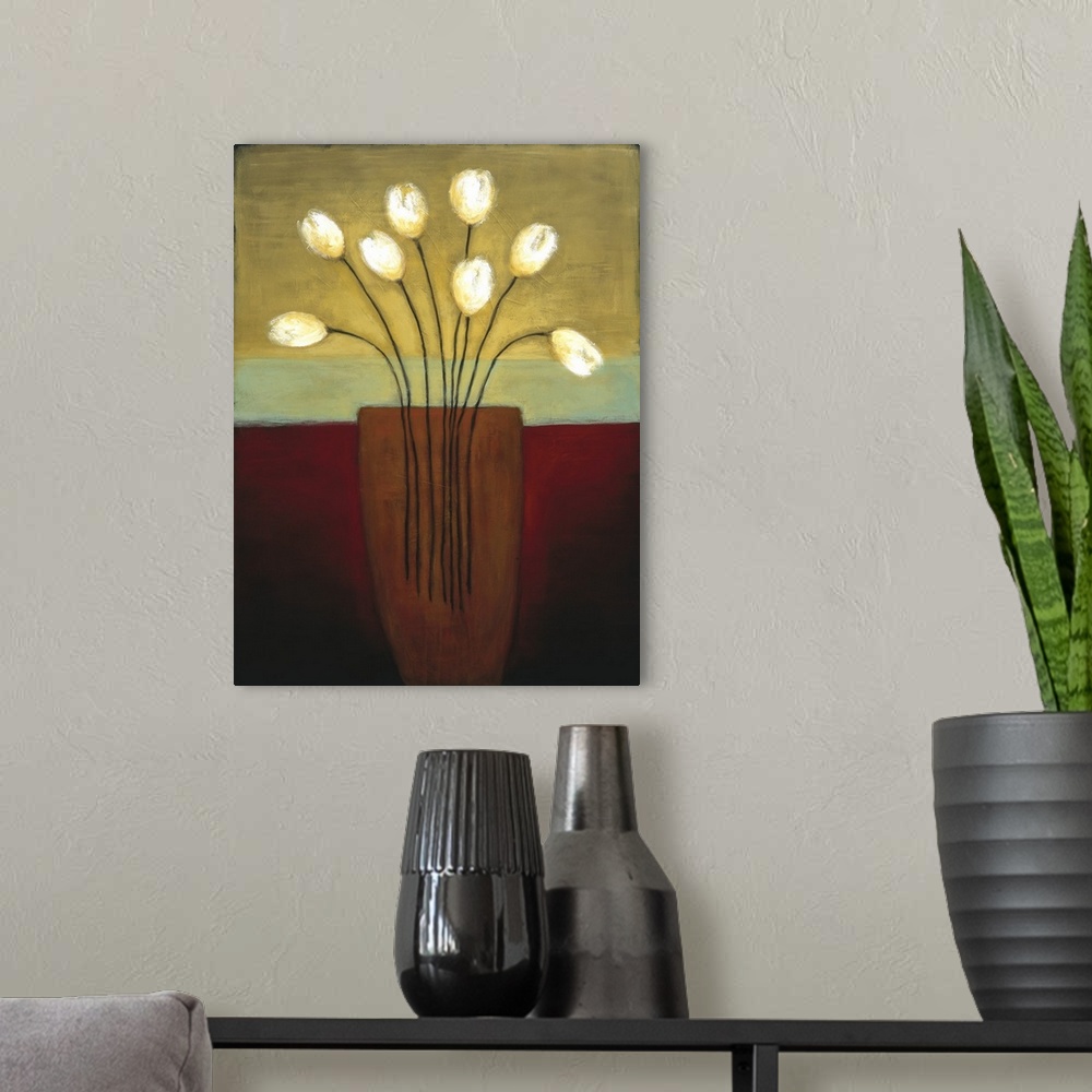 A modern room featuring Contemporary painting of white tulips within a vase in deep tones of brown, red and yellow.