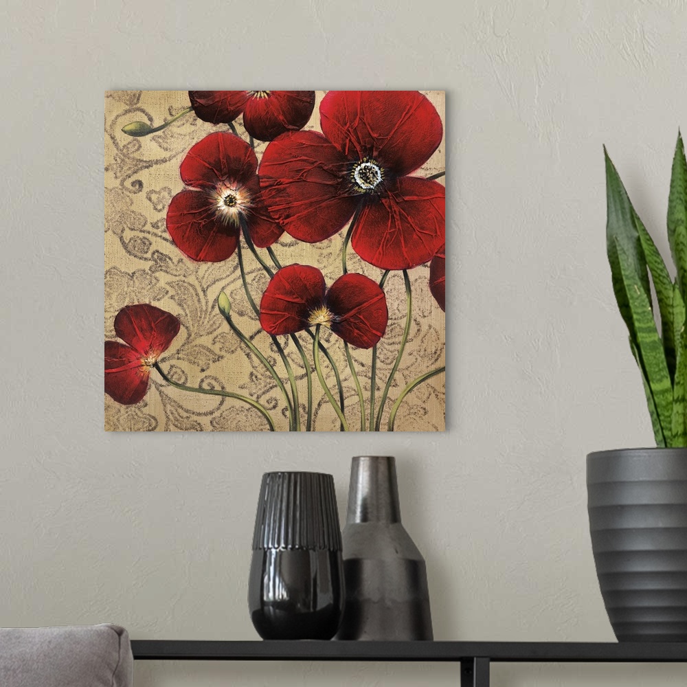 A modern room featuring Square painting of a group of red flowers with textured petals against a neutral backdrop with a ...