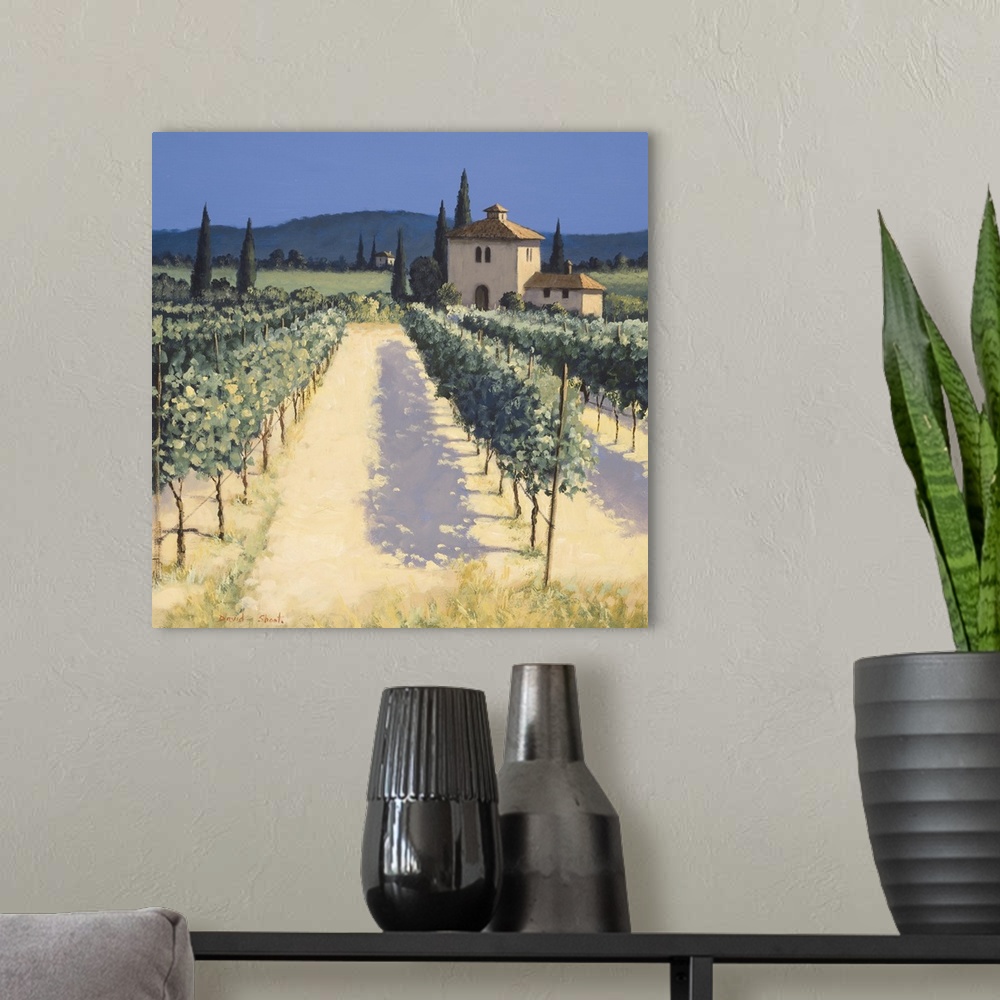 A modern room featuring Contemporary artwork of a vineyard in the European countryside.