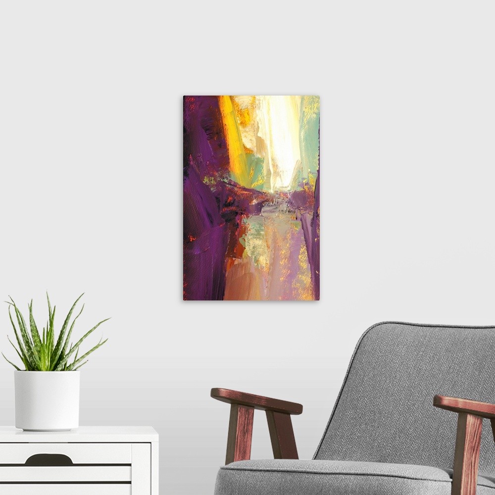 A modern room featuring A vertical abstract painting in vibrant colors of purple, yellow and red.