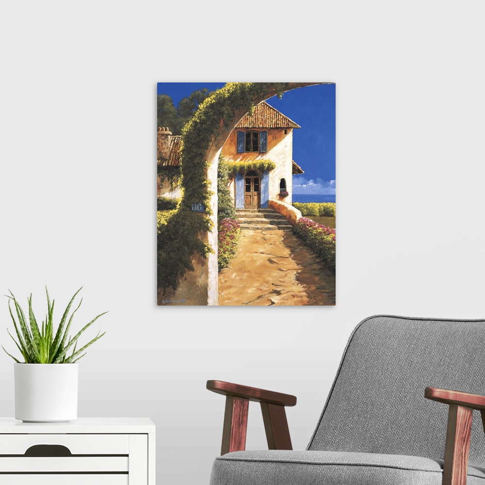 A modern room featuring Painting of a house in a rural village with a vine-covered archway.