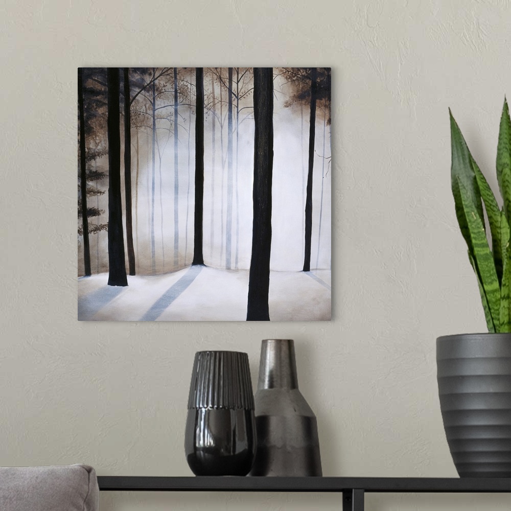 A modern room featuring Square contemporary painting of bare trees and snow in a forest.