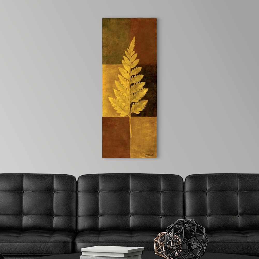 A modern room featuring Long vertical decorative art of a single fern leaf in gold with a checkered earth toned background.