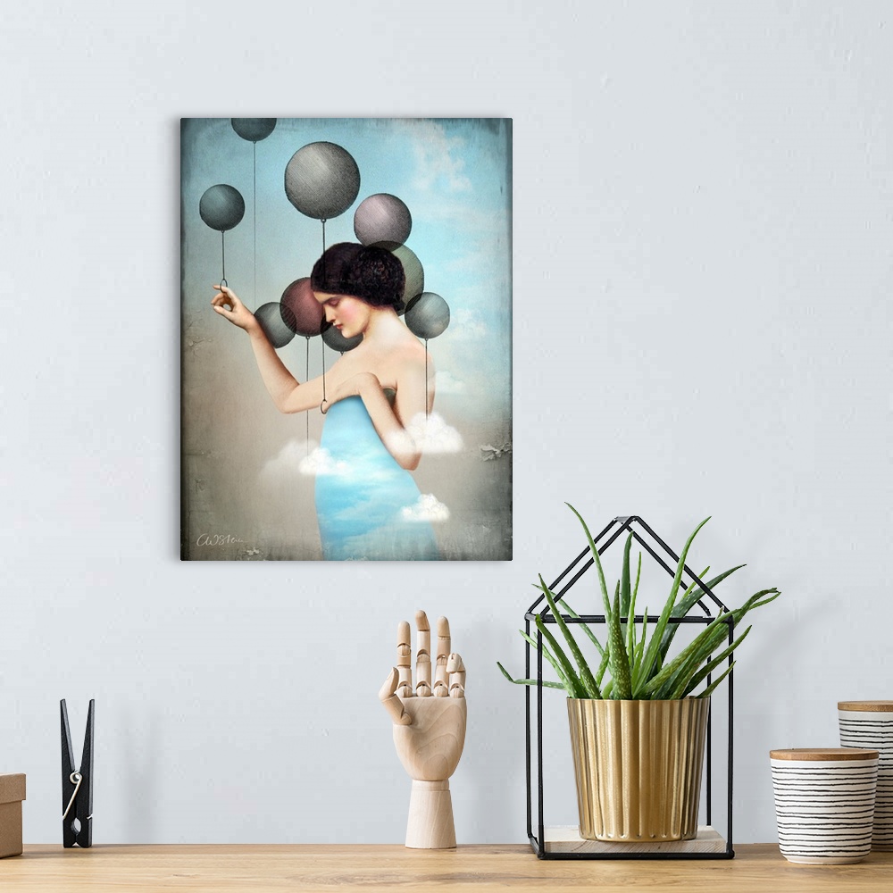 A bohemian room featuring A woman with a dress made of a blue sky is holding onto some balloons.