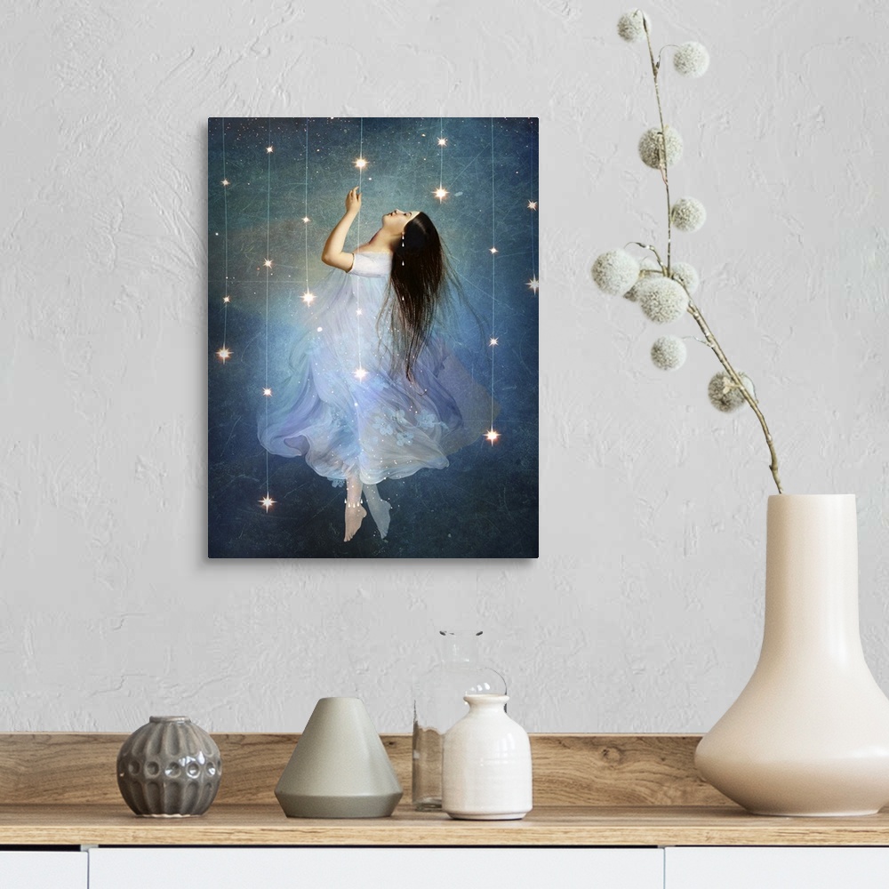 A farmhouse room featuring A conceptual artwork of a female floating in stars.