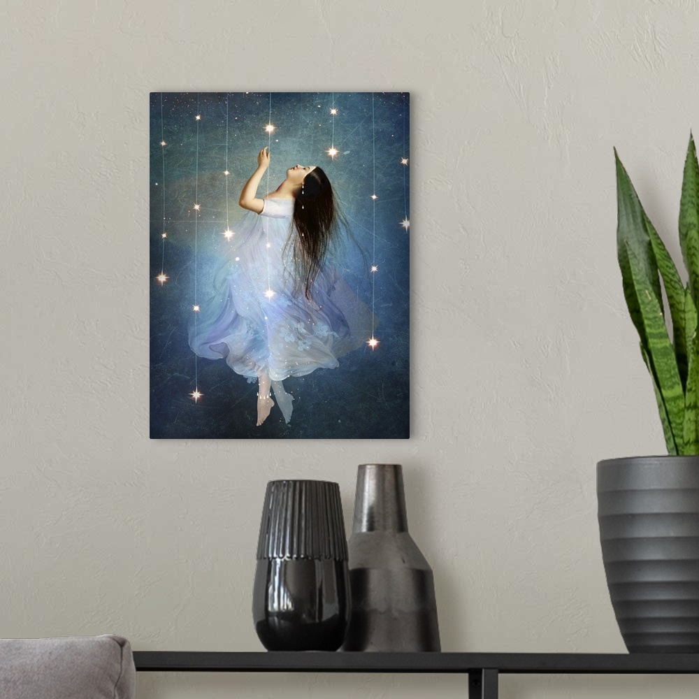 A modern room featuring A conceptual artwork of a female floating in stars.