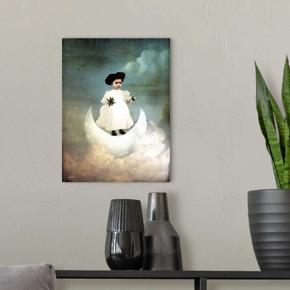 A modern room featuring A young child in white is standing of a crescent moon in the clouds.