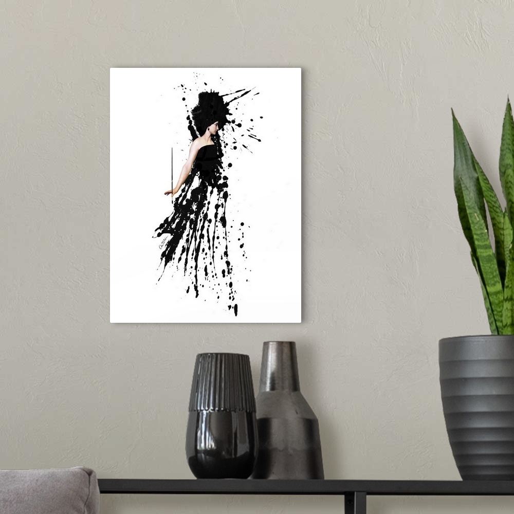 A modern room featuring A woman holding a paint brush has an outfit made out of black paint splatters.